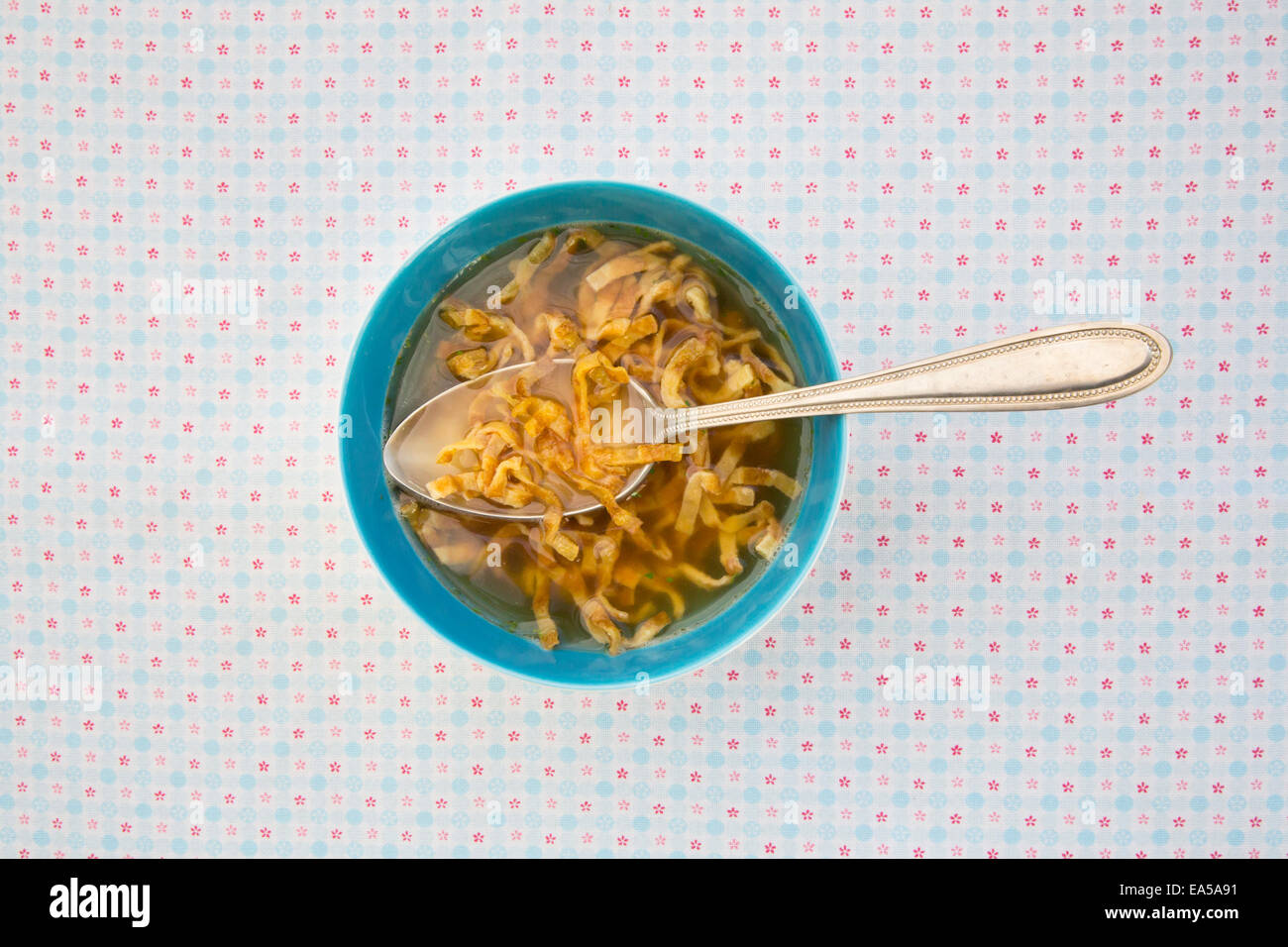Bowl of Swabian Flaedle soup on cloth Stock Photo