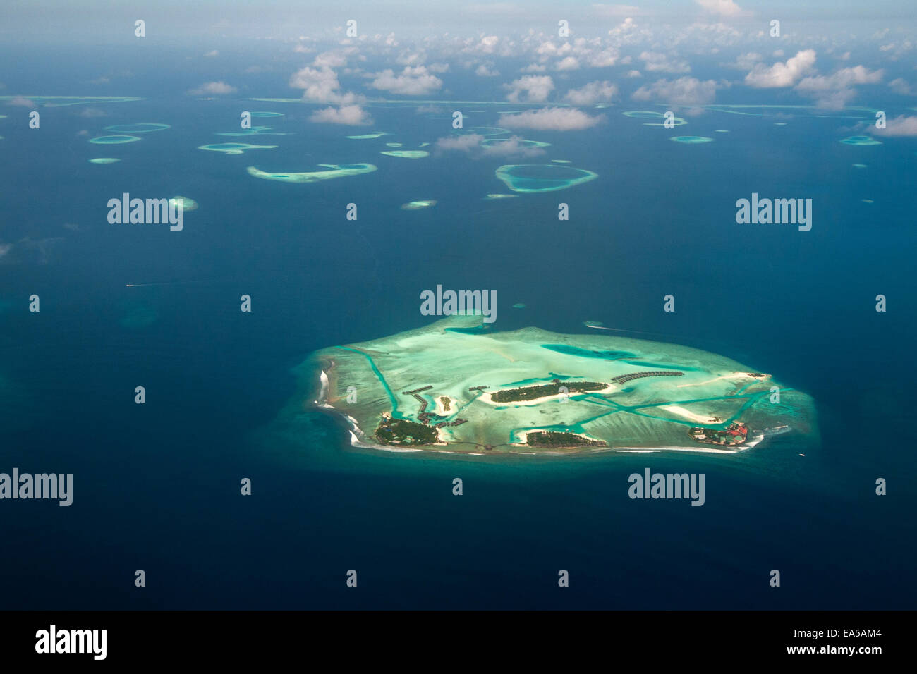 Aerial view of Maldives atoll and reefs seen from a sea plane Stock Photo