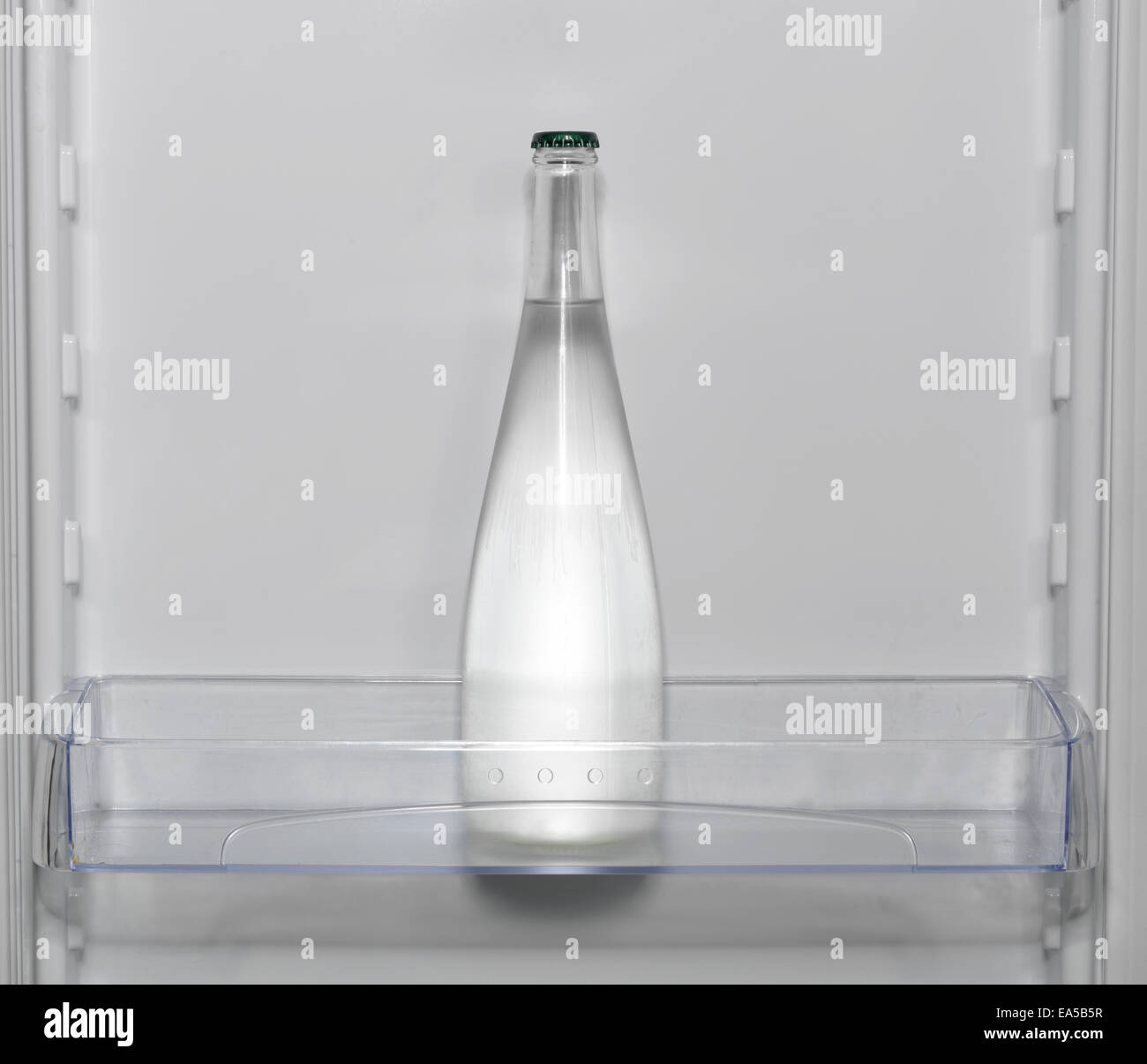 https://c8.alamy.com/comp/EA5B5R/glass-water-bottle-in-refrigerator-EA5B5R.jpg