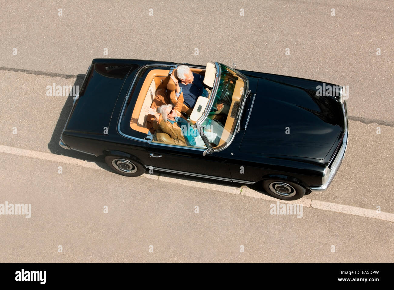 Car Driving Down Street Stock Photos & Car Driving Down Street Stock ...