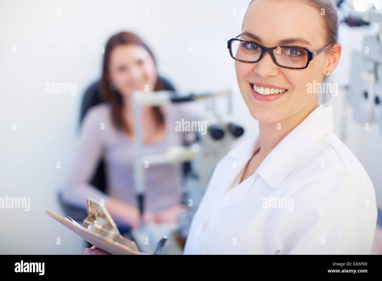 Portrait of smiling eye doctor Stock Photo Alamy