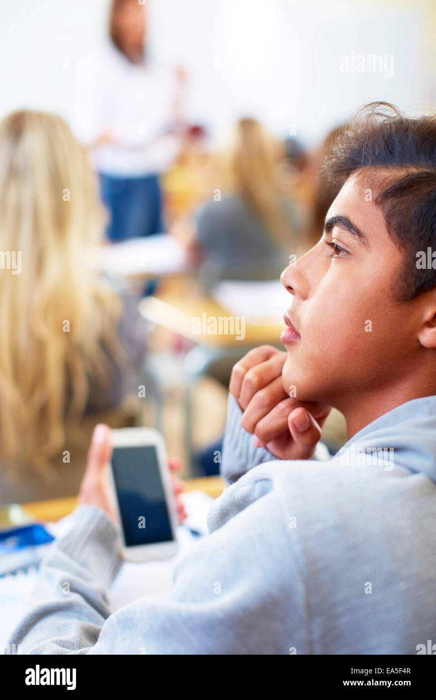 Student using cell phone in classroom Stock Photo Alamy