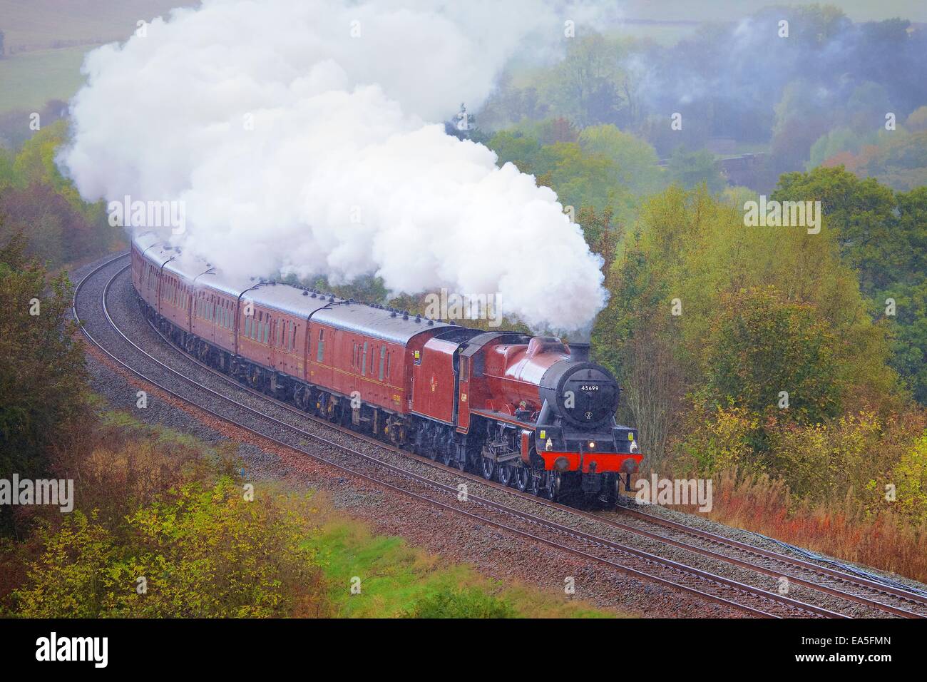 Galatea steam train on the Settle to Carlisle Railway Line near Low Baron Wood Farm, Armathwaite, Eden Valley, Cumbria, England. Stock Photo