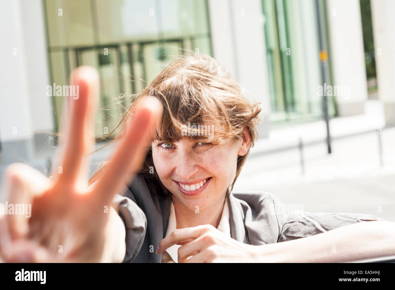 One woman arm up career success hi-res stock photography and images - Alamy
