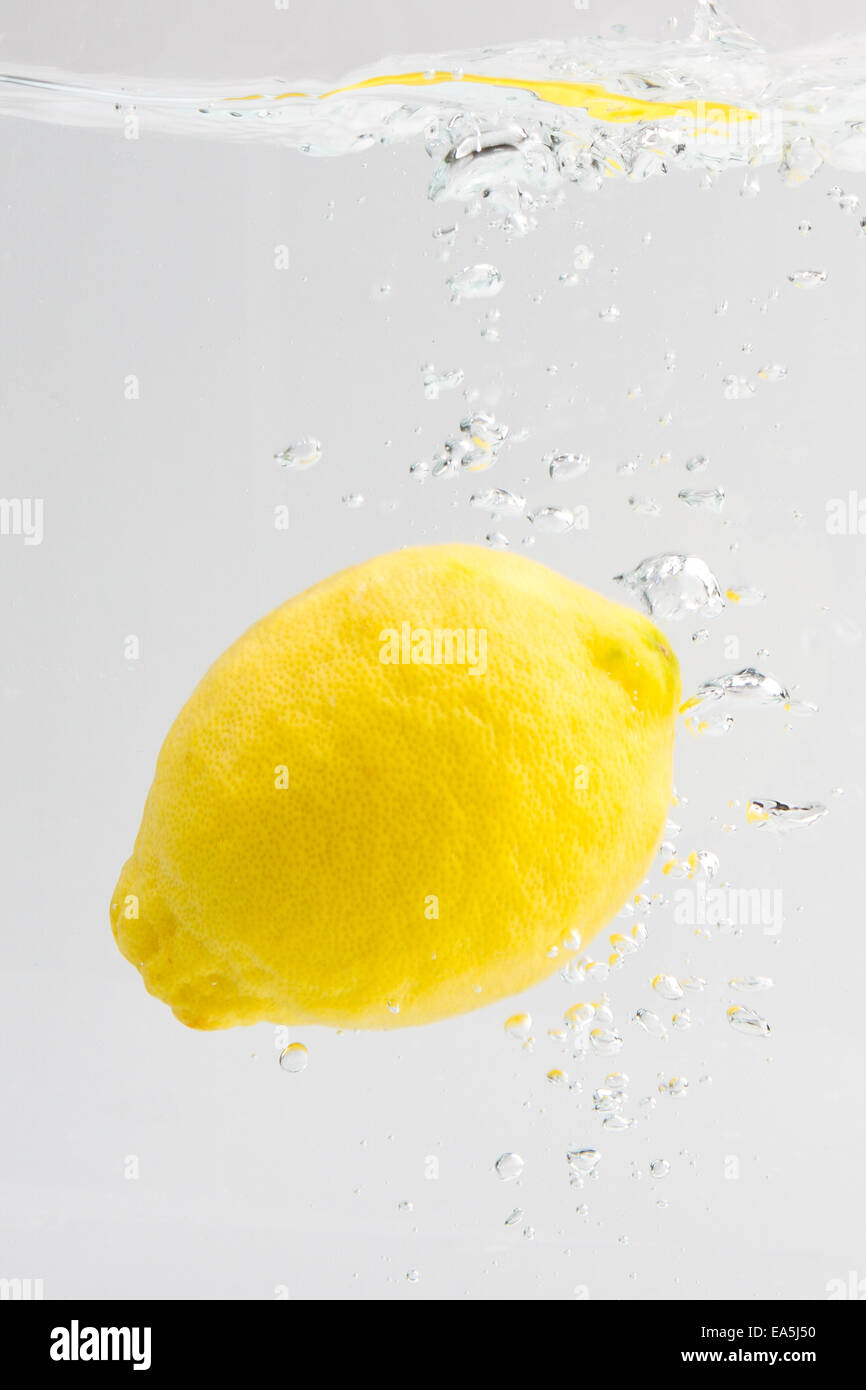 Lemon with water splash Stock Photo