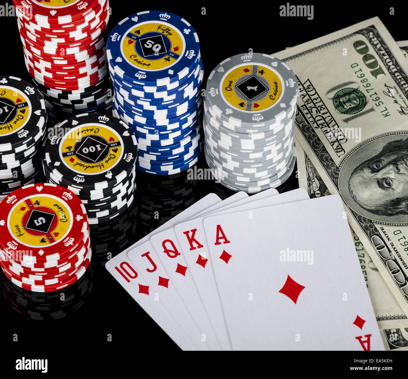 Poker chips Playing cards and dollars Stock Photo Alamy