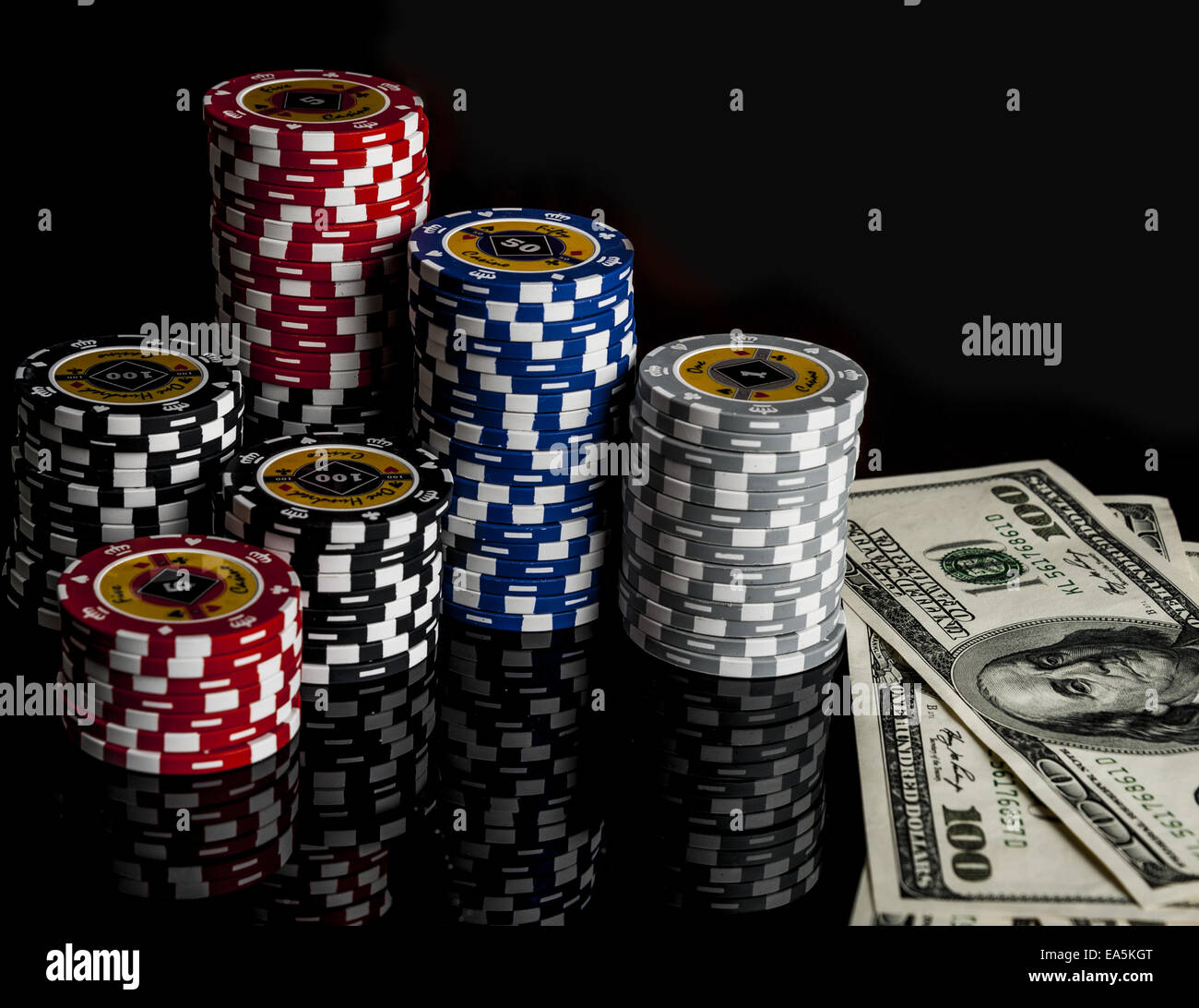 Poker chips Playing cards and dollars Stock Photo Alamy