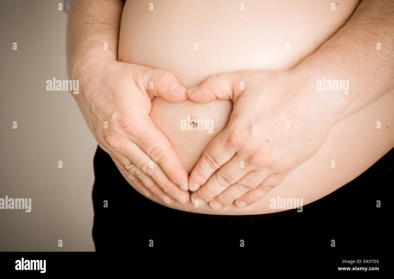 Pregnant belly Stock Photo