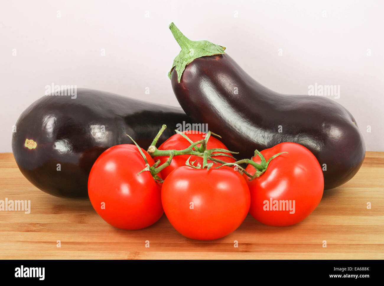 Eggplants with tomato Stock Photo Alamy