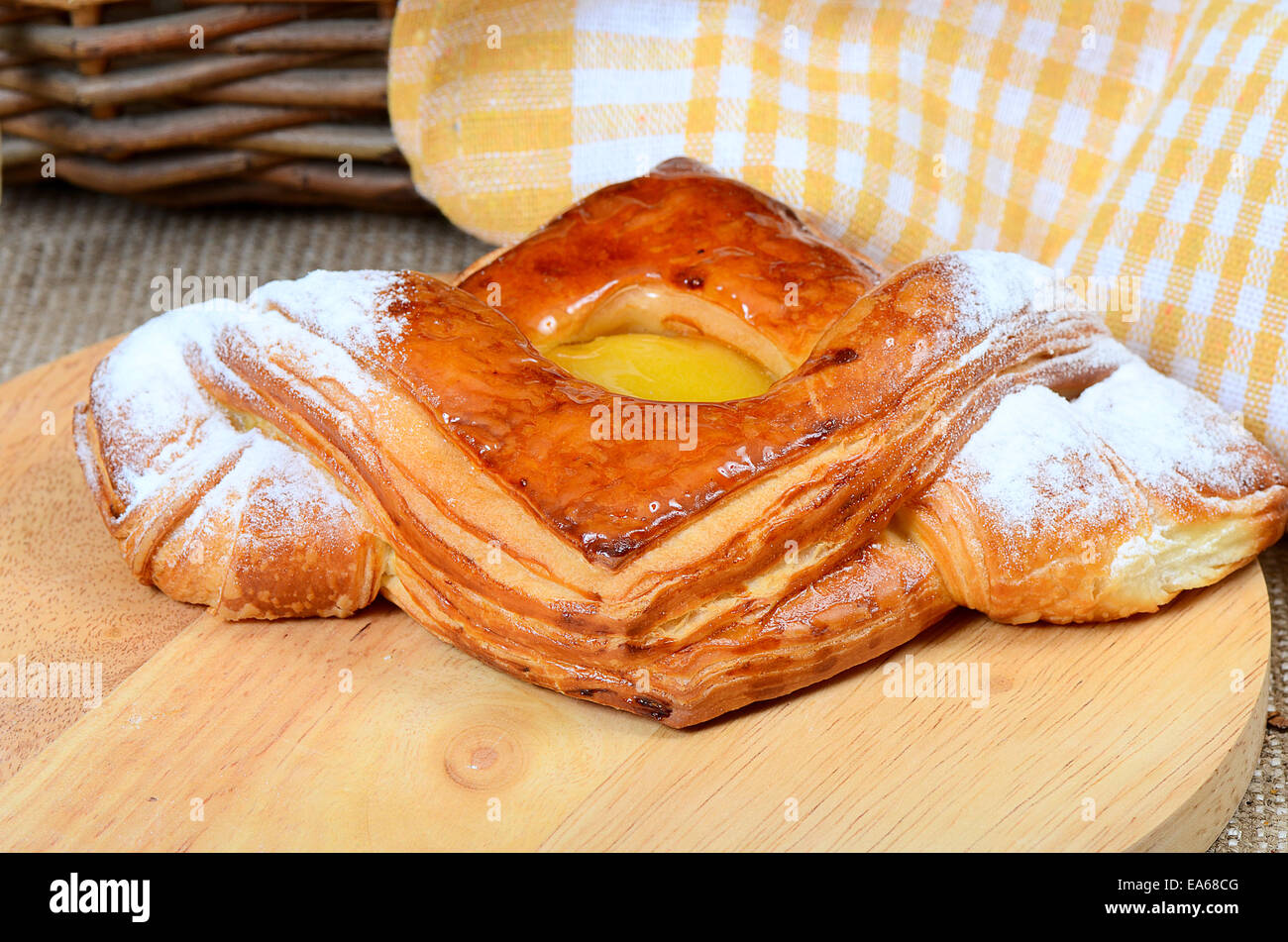 Roll from flaky pastry with apricots Stock Photo Alamy