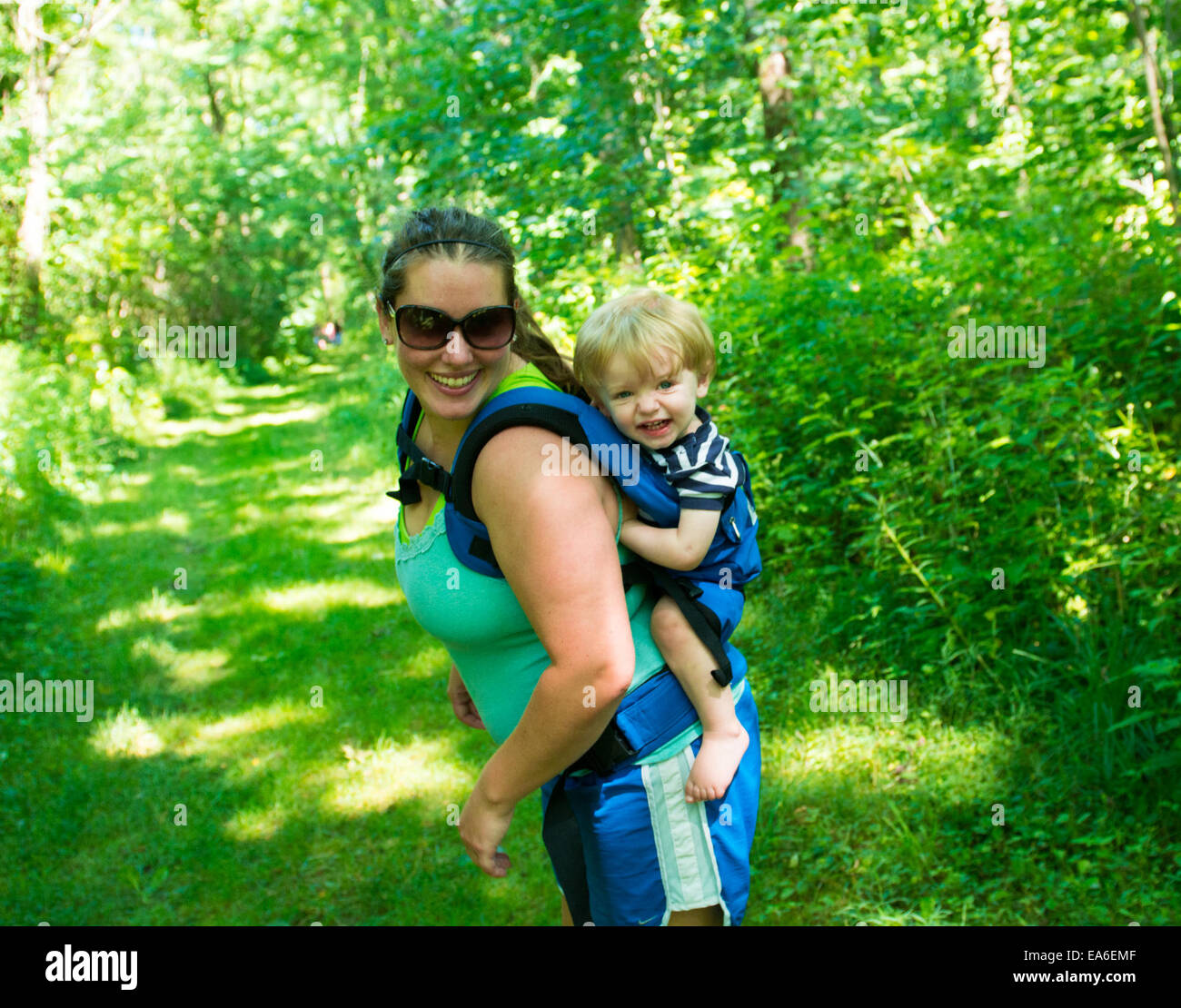 Mother and son hiking in the woods, Indiana, USA Stock Photo