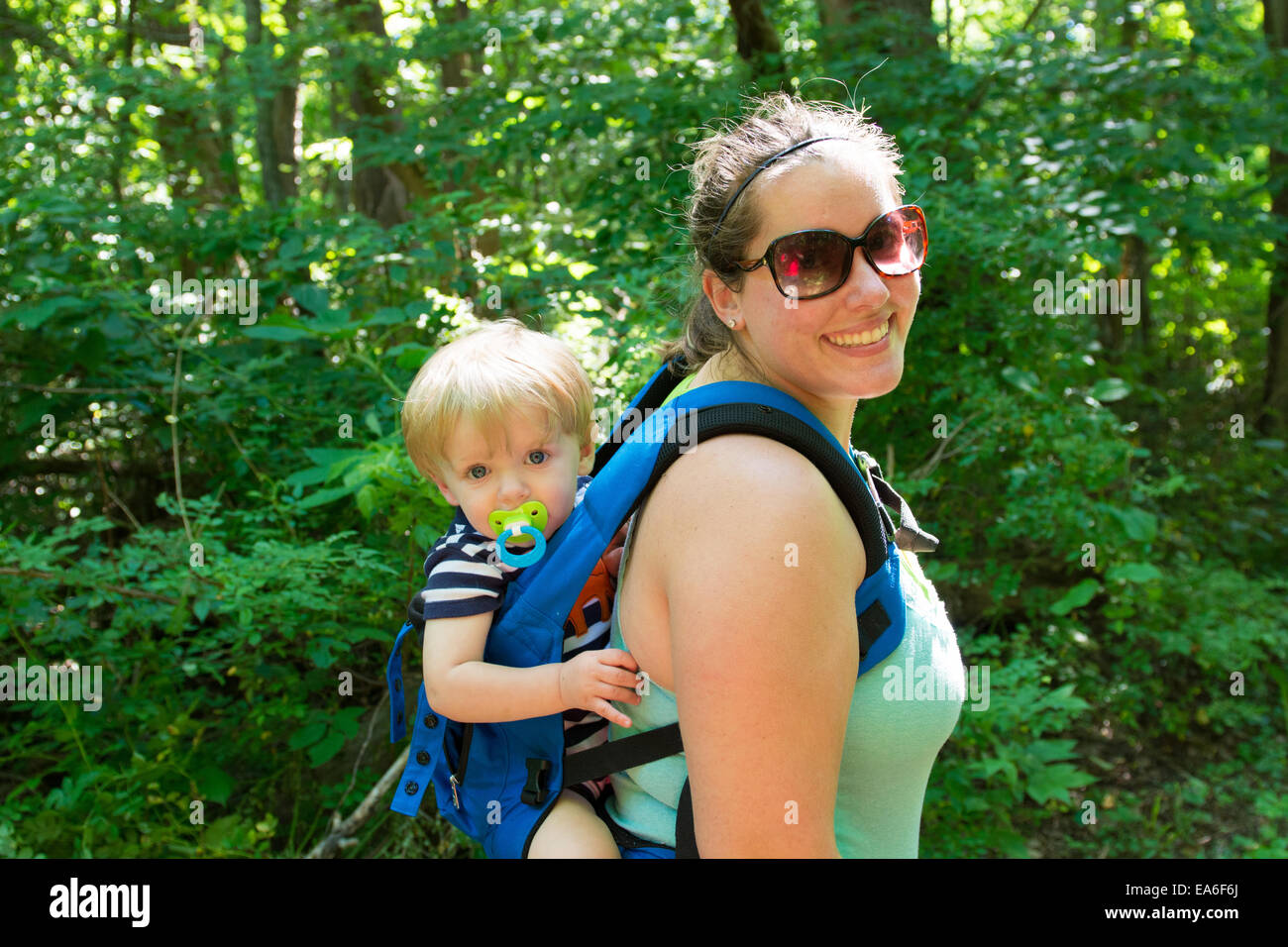 Mother and son hiking in the woods, Indiana, USA Stock Photo
