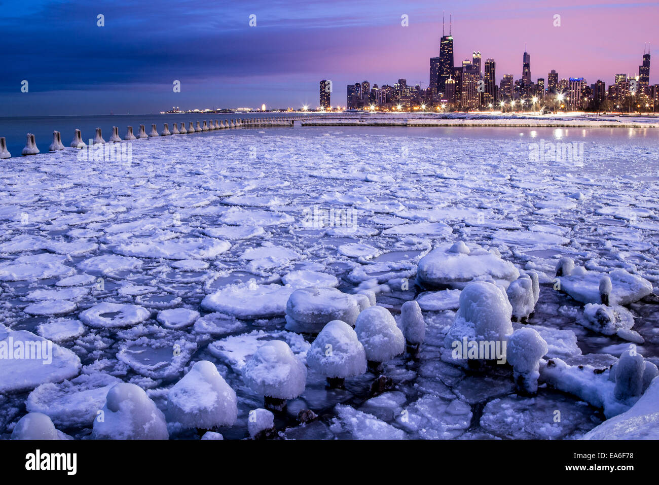 City skyline seen across icy harbor, Chicago, Illinois, United States Stock Photo