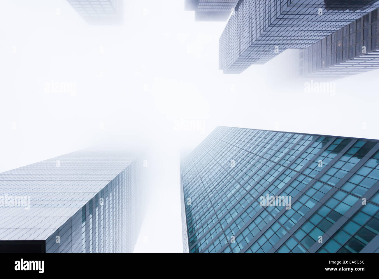 USA, New York State, New York City, Manhattan, View of skyscrapers in mist Stock Photo