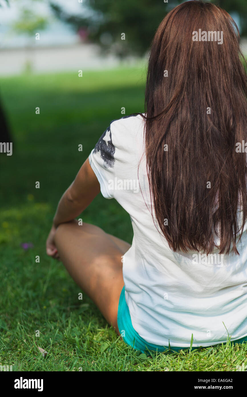 young girl sitting in the lotus position Stock Photo - Alamy