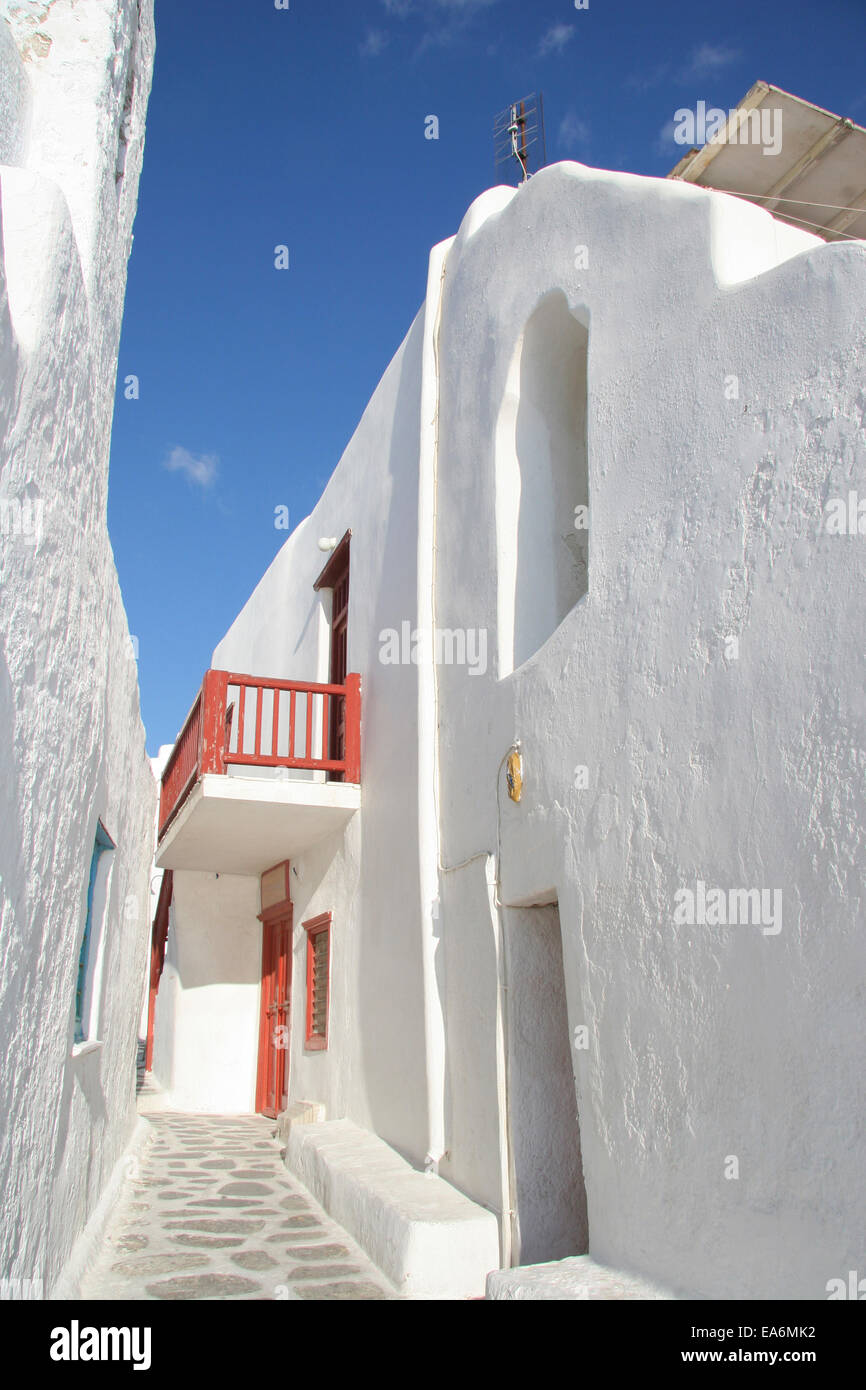 Traditional narrow street with whitewashed buildings, Mykonos town, Cyclades, Greece. Stock Photo