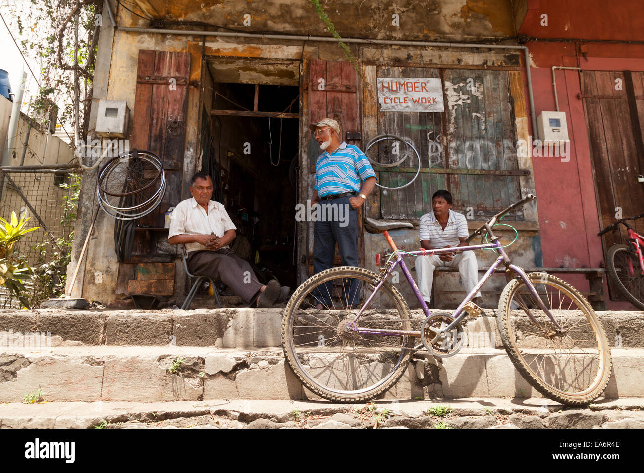 A cycle repair shop, example of local industry,  Flacq town, Mauritius Stock Photo