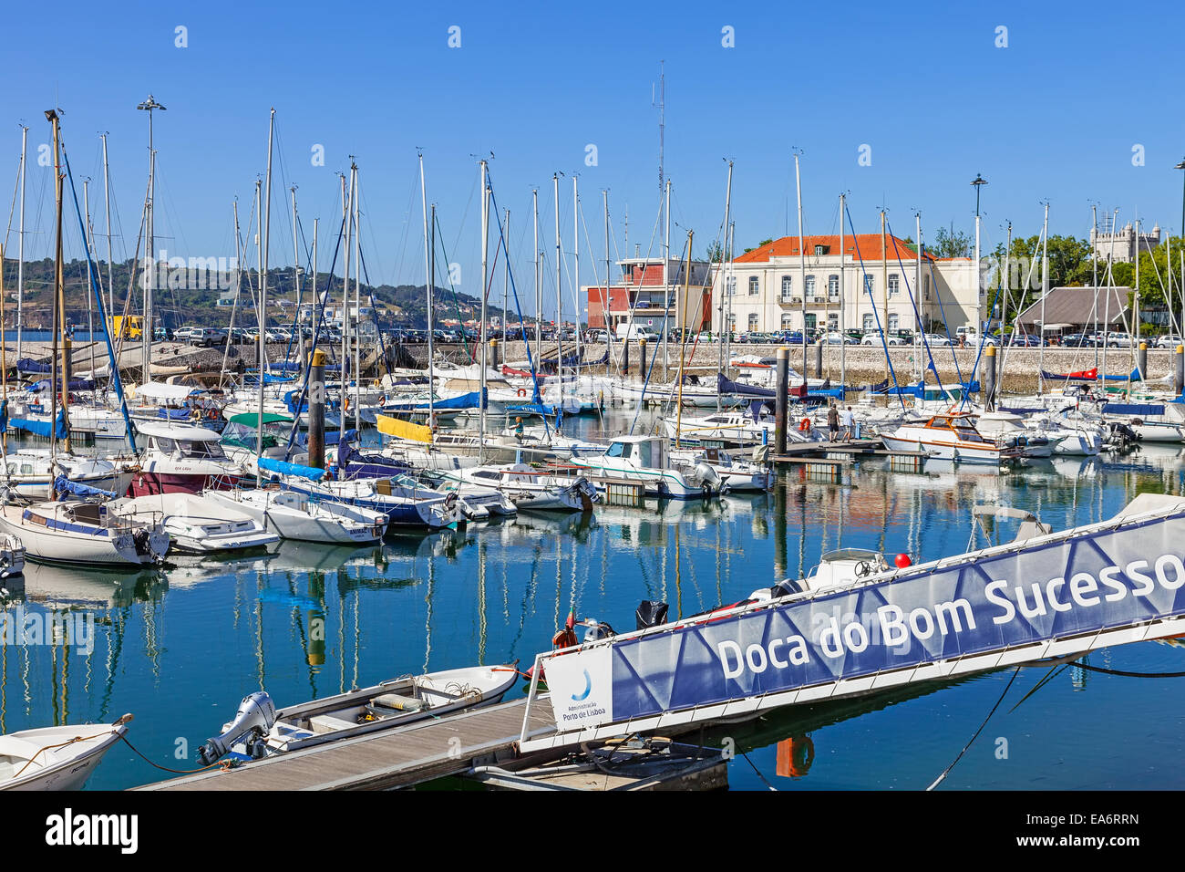 Doca do Bom Sucesso Marina in Belem district filled with docked yachts, sailboats and motorboats during summer. Lisbon, Portugal Stock Photo