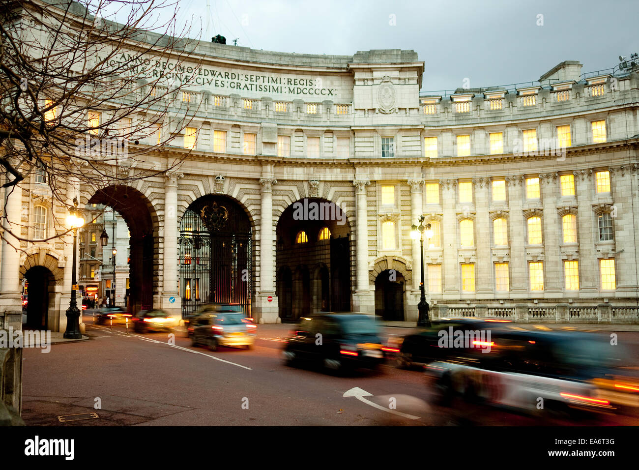 Admiralty Arch, London, UK at dusk with blurred motion vehicles Stock Photo