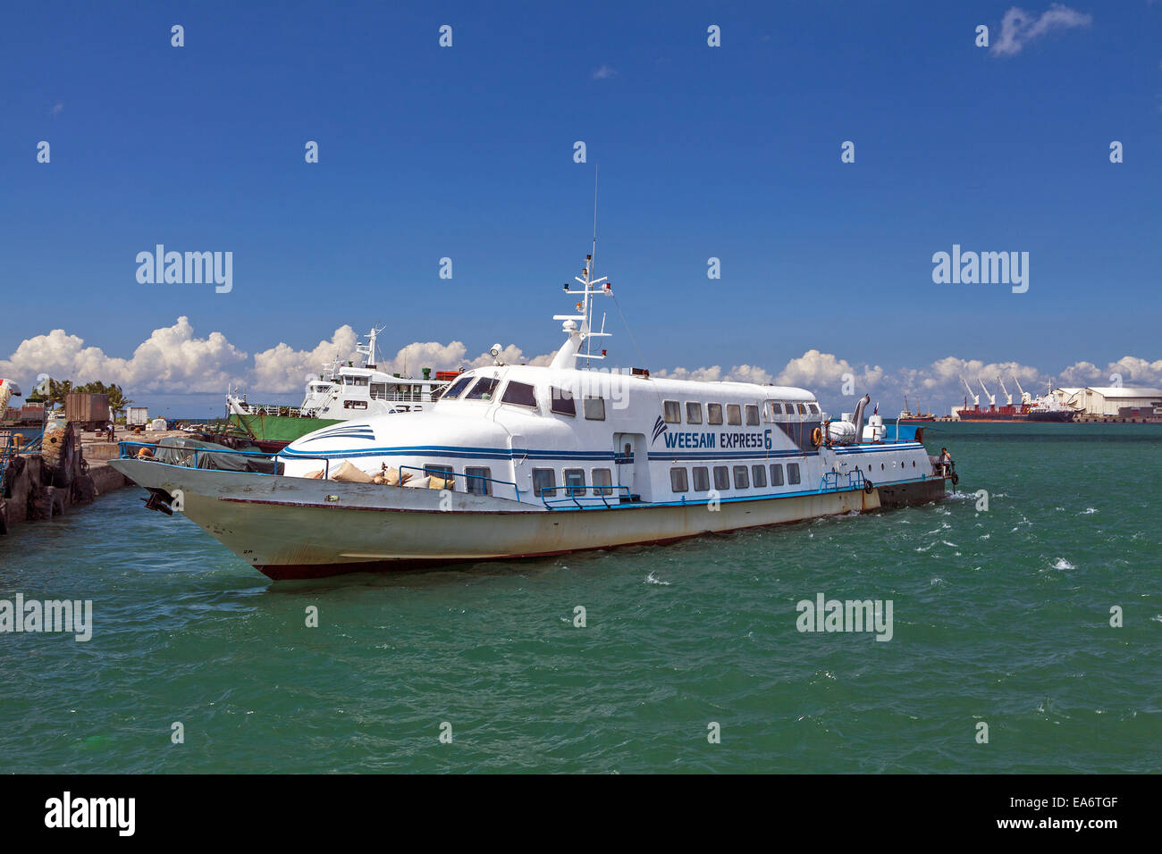 One of the inter island fast ferry boats arrives at port in Bacolod City, Negros Occidental Island, Philippines. Stock Photo
