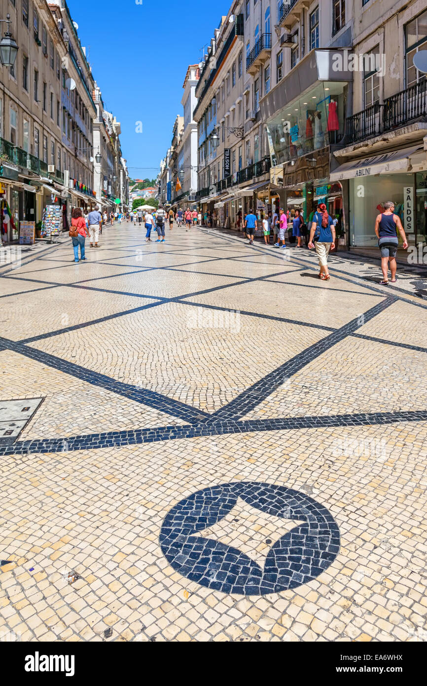 Rua Augusta Street in the Baixa District of Lisbon. The most cosmopolitan street of the capital is always full of people. Stock Photo