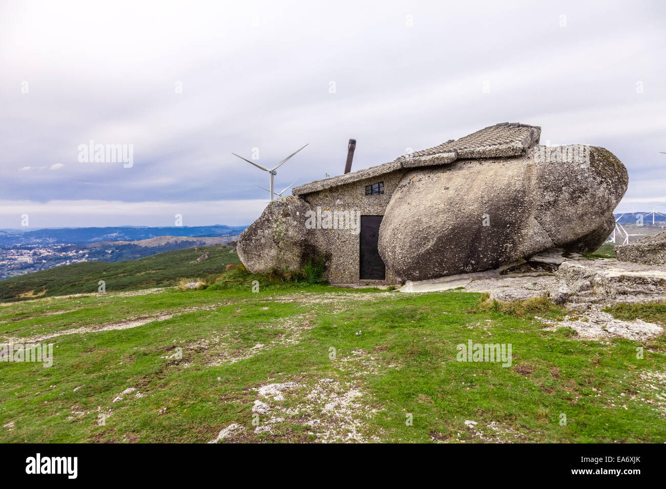 Casa do Penedo, a house built between huge rocks. Considered one of the strangest houses in the world. Fafe, Portugal. stone boulders strange unique Stock Photo