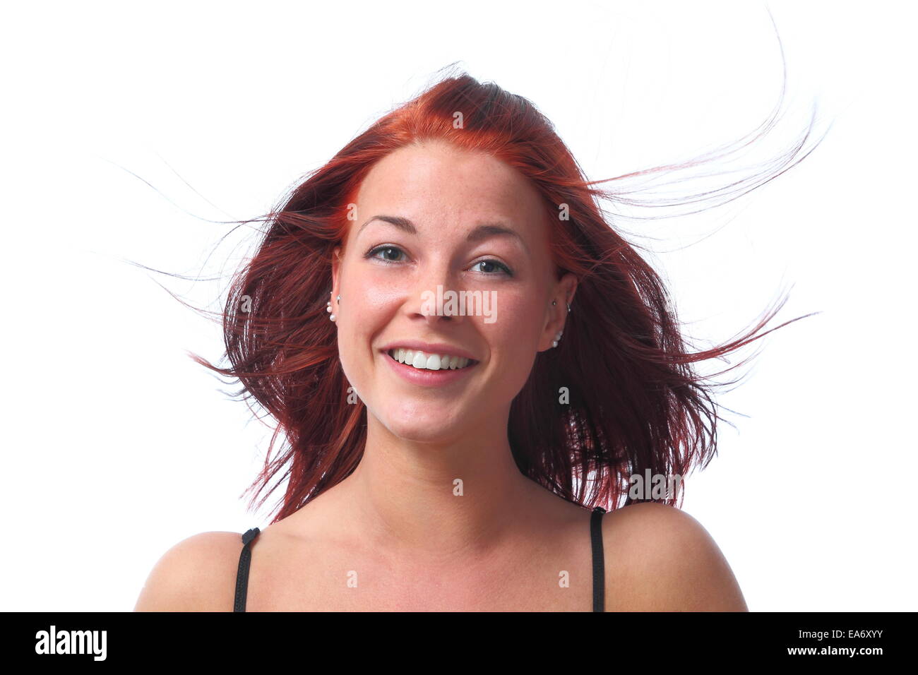 A Young dynamik redhaired woman Stock Photo