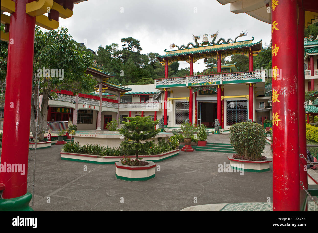 Red columns are features at the Bell Church, a Taoist Temple, located in Baguio City, Northern Luzon, Philippine Islands. Stock Photo