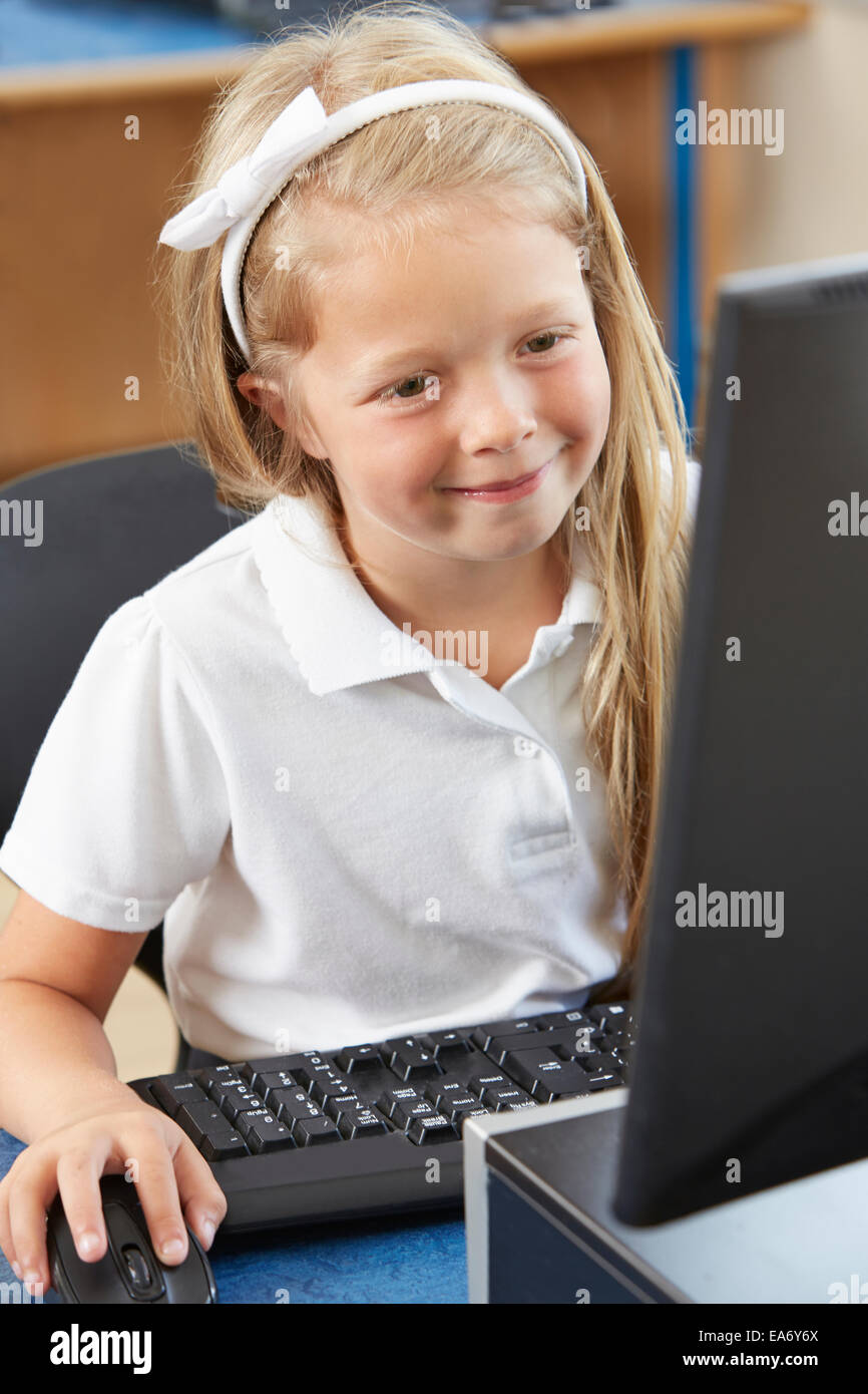 Female Elementary School Pupil In Computer Class Stock Photo - Alamy
