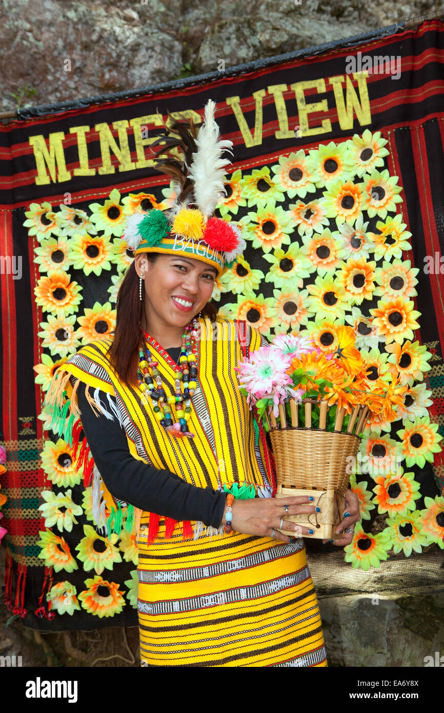 A beautiful Filipina woman dresses in traditional Ifugao clothing at Mines View Park in Baguio City, Philippines. Stock Photo