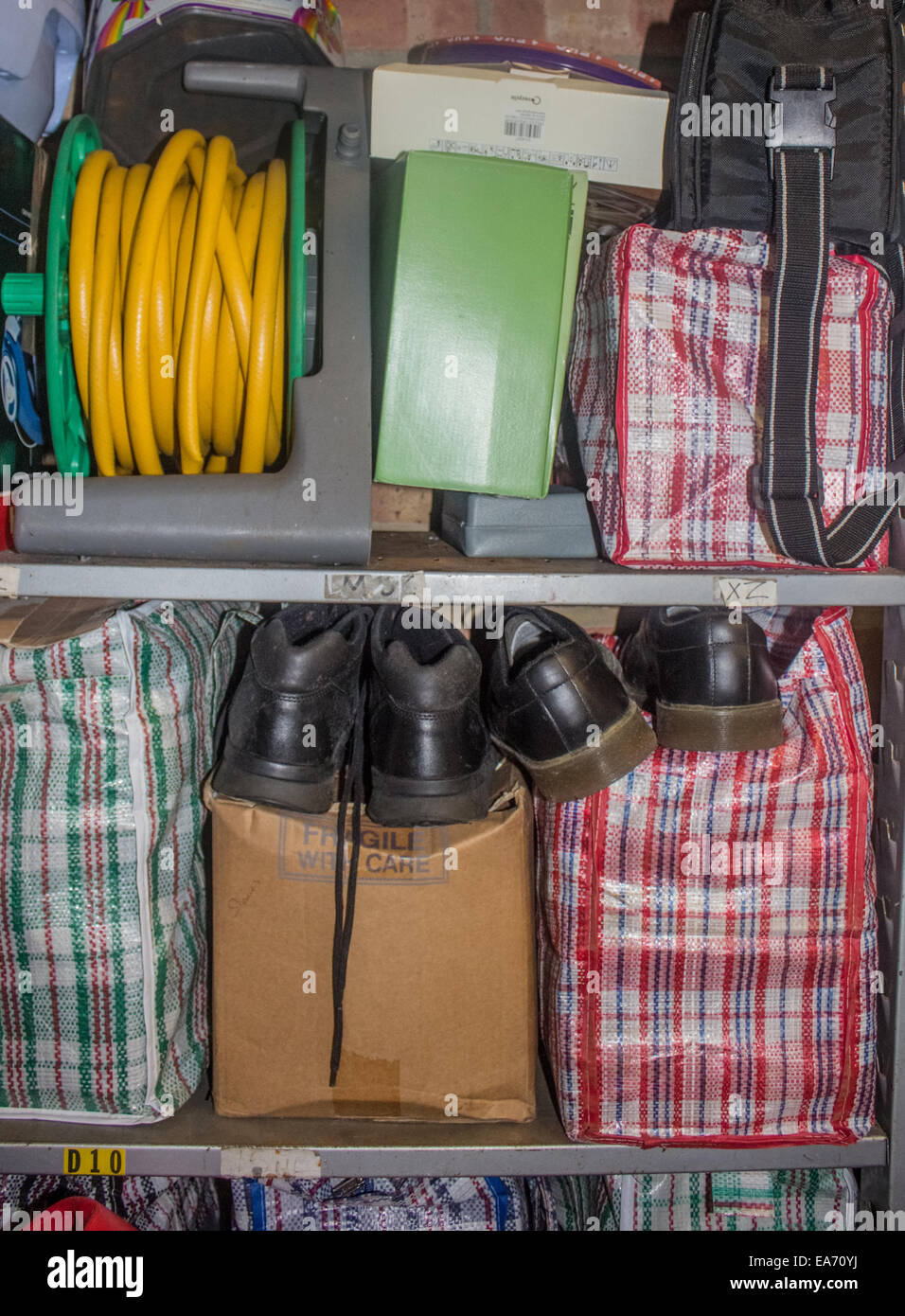 Random things tidily stored in a garage Stock Photo Alamy