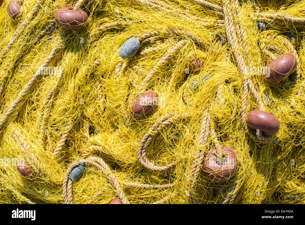 on fish boat. Yellow net Stock Photo Alamy