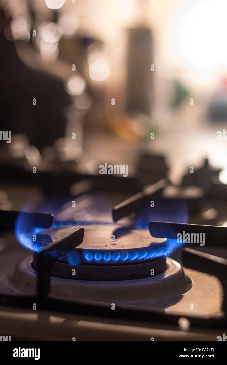 Gas cooker burning for heat in the kitchen, shallow depth of field