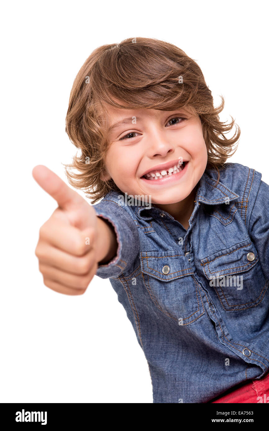 Little boy doing thumbs up for camera Stock Photo - Alamy