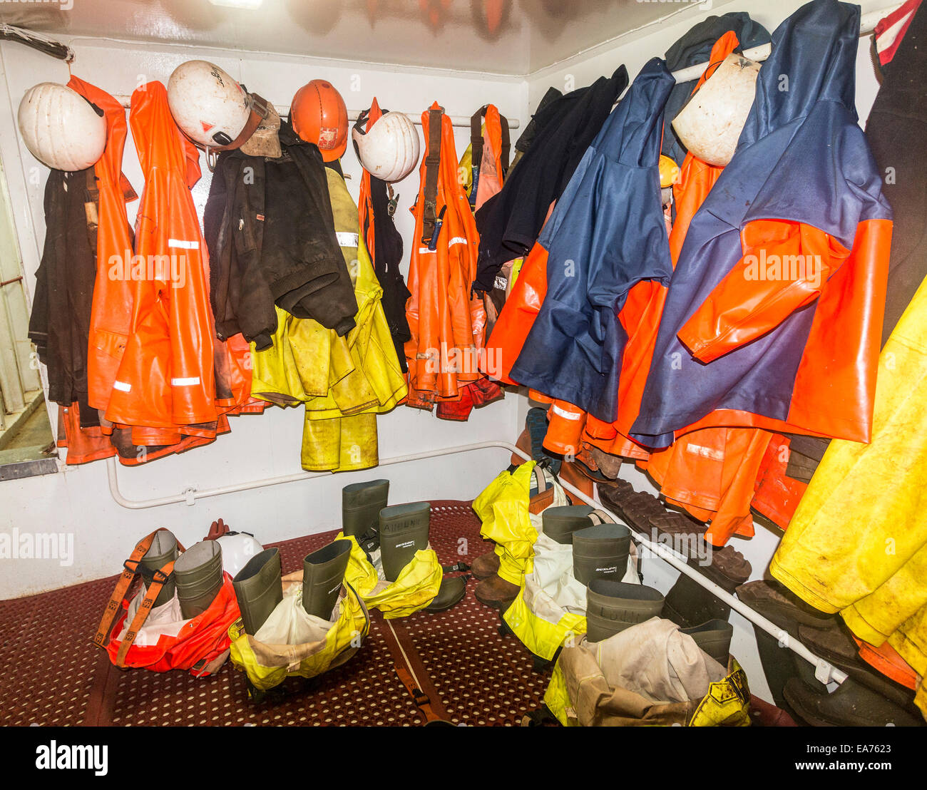 Rain gear in a fishing boat in the main working harbor of