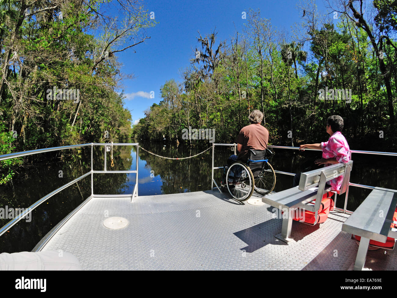 Pontoon boat on Pepper Creek from the parking lot to the entrance of the Homosassa Springs Wildlife State Park Stock Photo