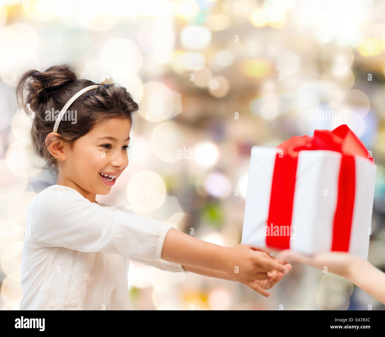 smiling little girl with gift box Stock Photo - Alamy