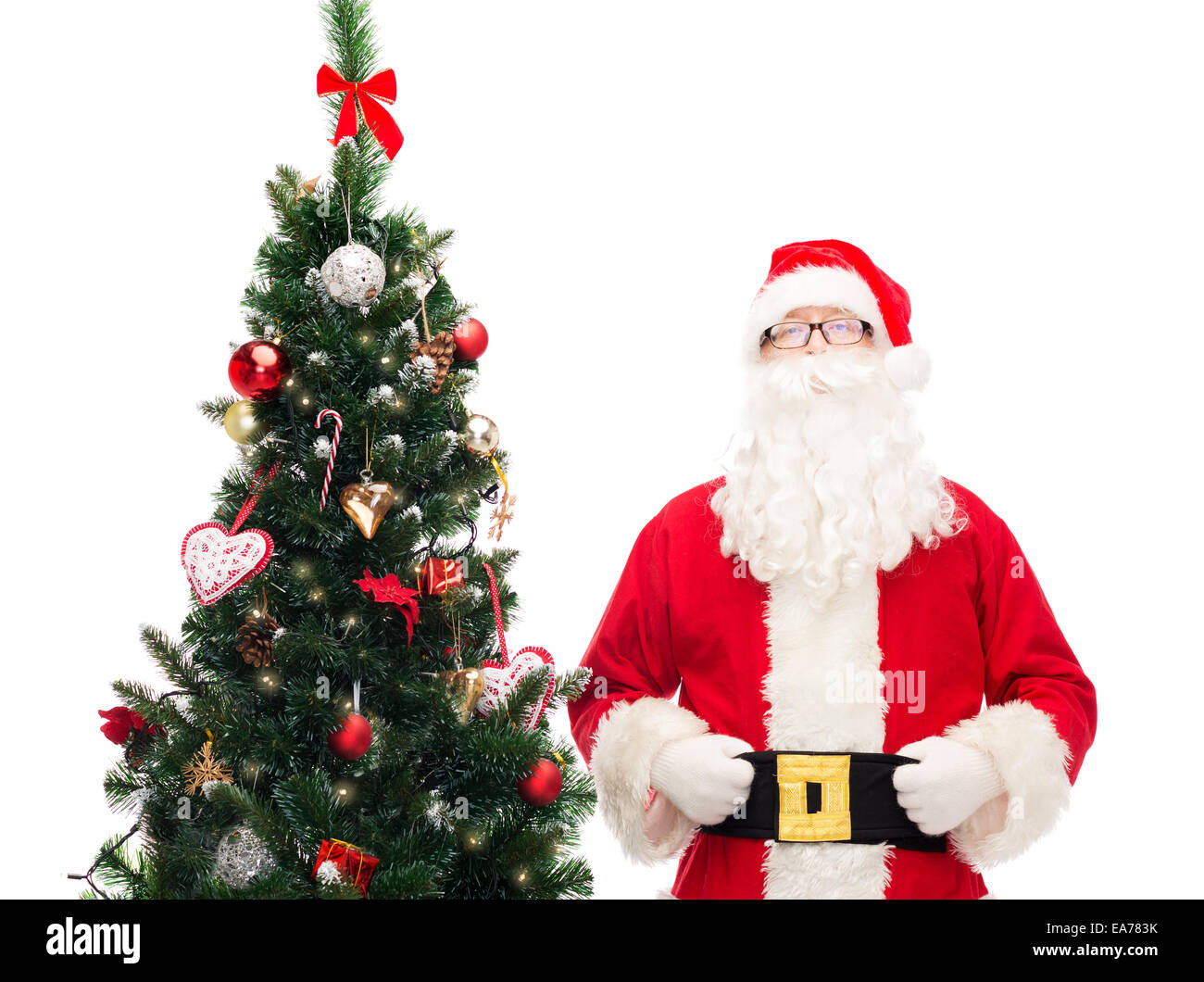 man in costume of santa claus with christmas tree Stock Photo - Alamy