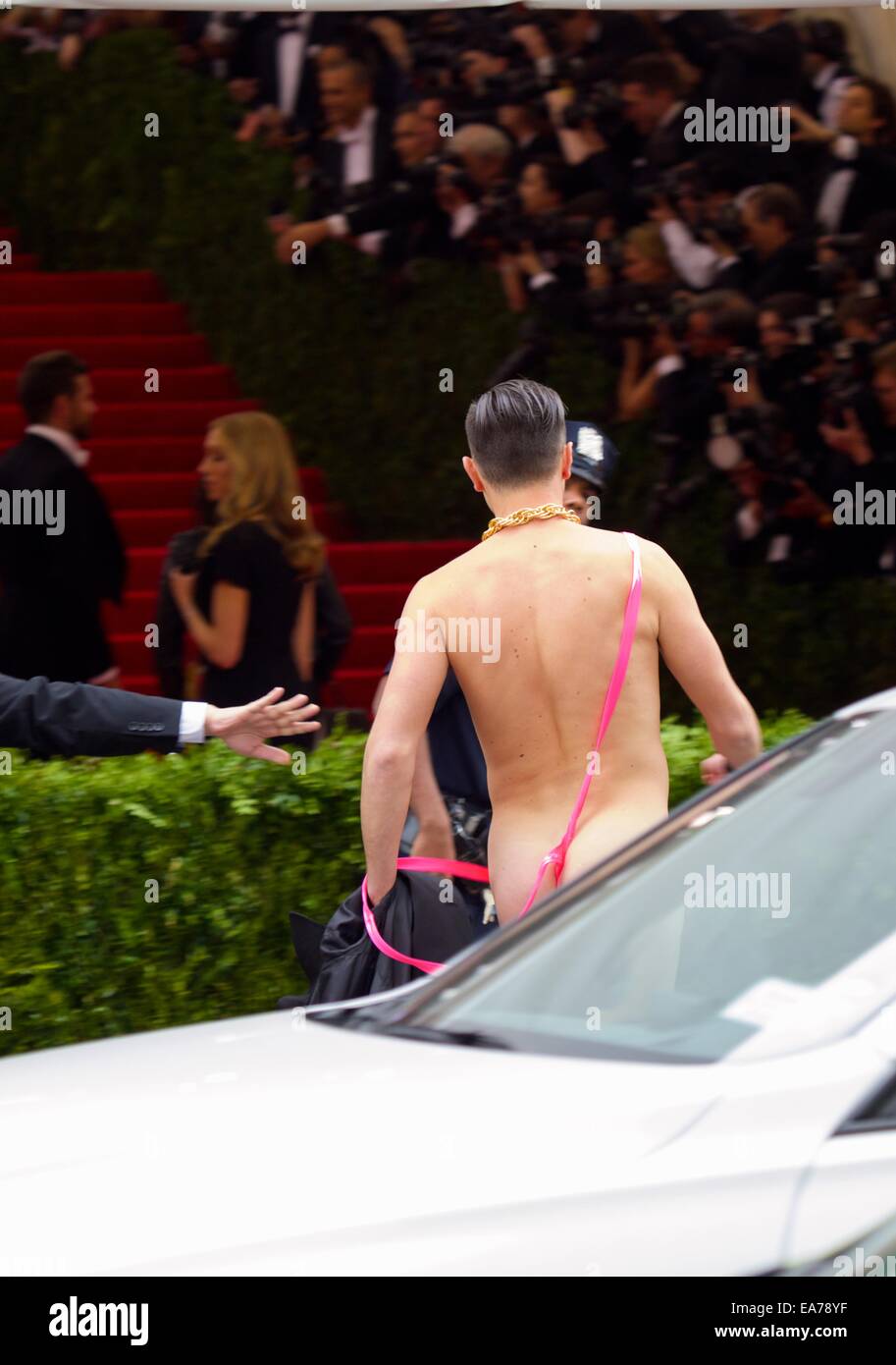 2014 Met Gala at the Metropolitan Museum of Art - Male streaker wearing a pink mankini and gold chain crashes the red carpet  Where: New York City, New York, United States When: 05 May 2014 Stock Photo