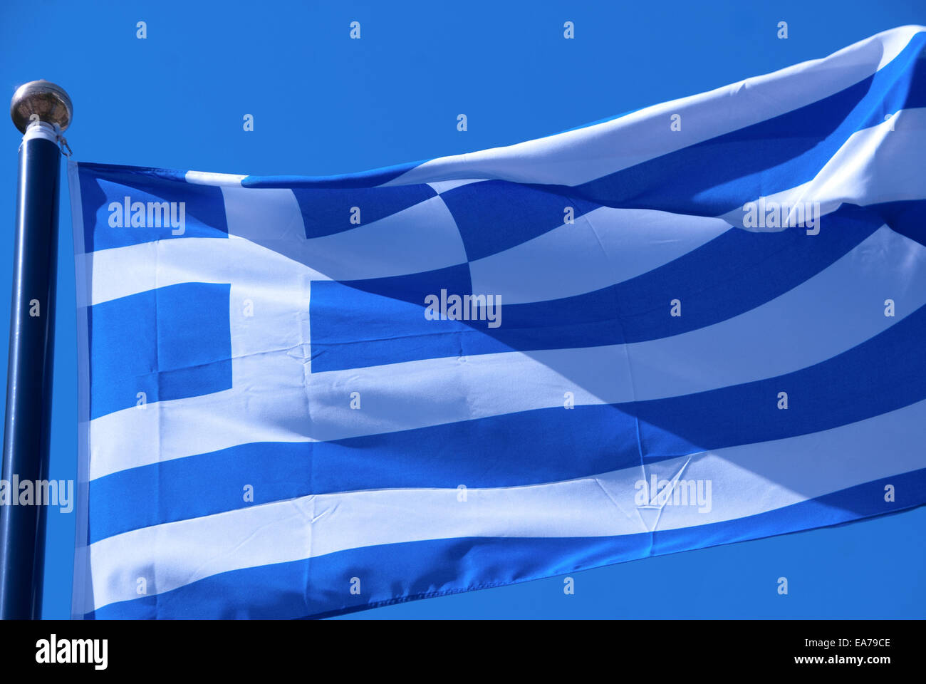 greece flag and blue sky Stock Photo