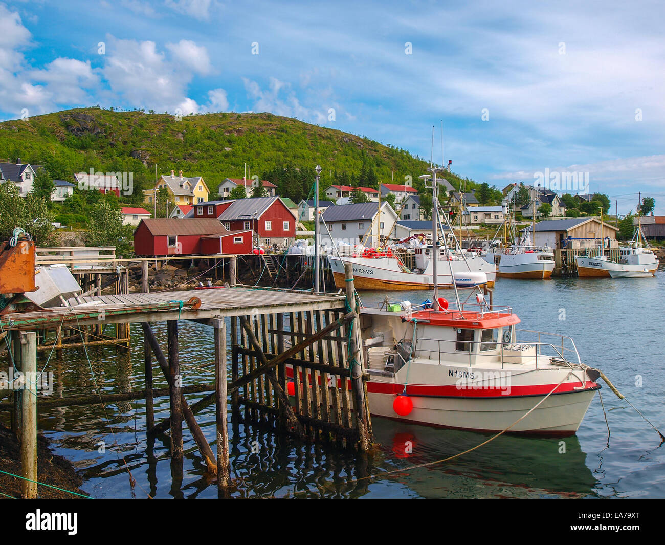 The vibrant fishing village of Rein with many traditional Rorbuer, fishermen's cabins. Lofoten Islands Stock Photo