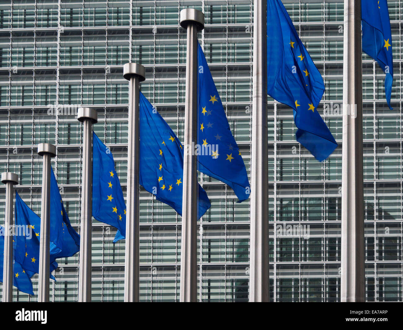 European Union flags in front of the Berlaymont building, headquarters of the European commission in Brussels, Belgium, Europe Stock Photo