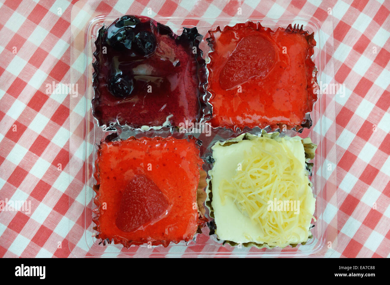Cheesecake and strawberry jam cake on fabric Stock Photo Alamy