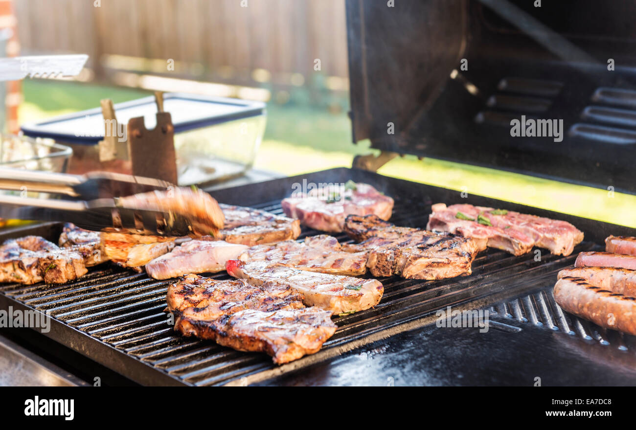 Lamb being grilled on the at an barbeque outdoor dinner Stock Photo - Alamy