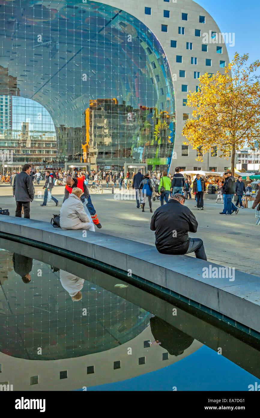 Exterior and mirror image of the new Market hall or in Dutch Markthal Rotterdam in Rotterdam, South Holland, The Netherlands. Stock Photo