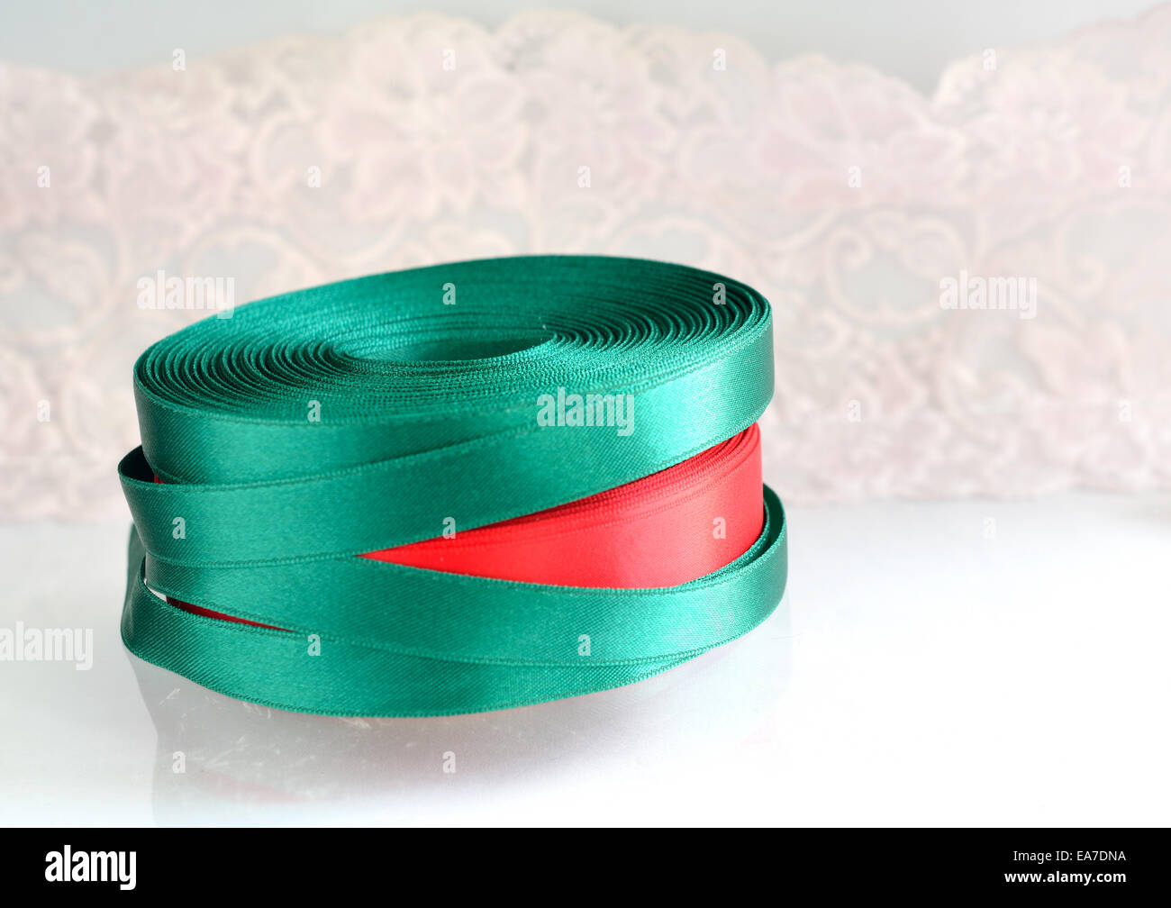 Green ribbon roll on a white background Stock Photo Alamy