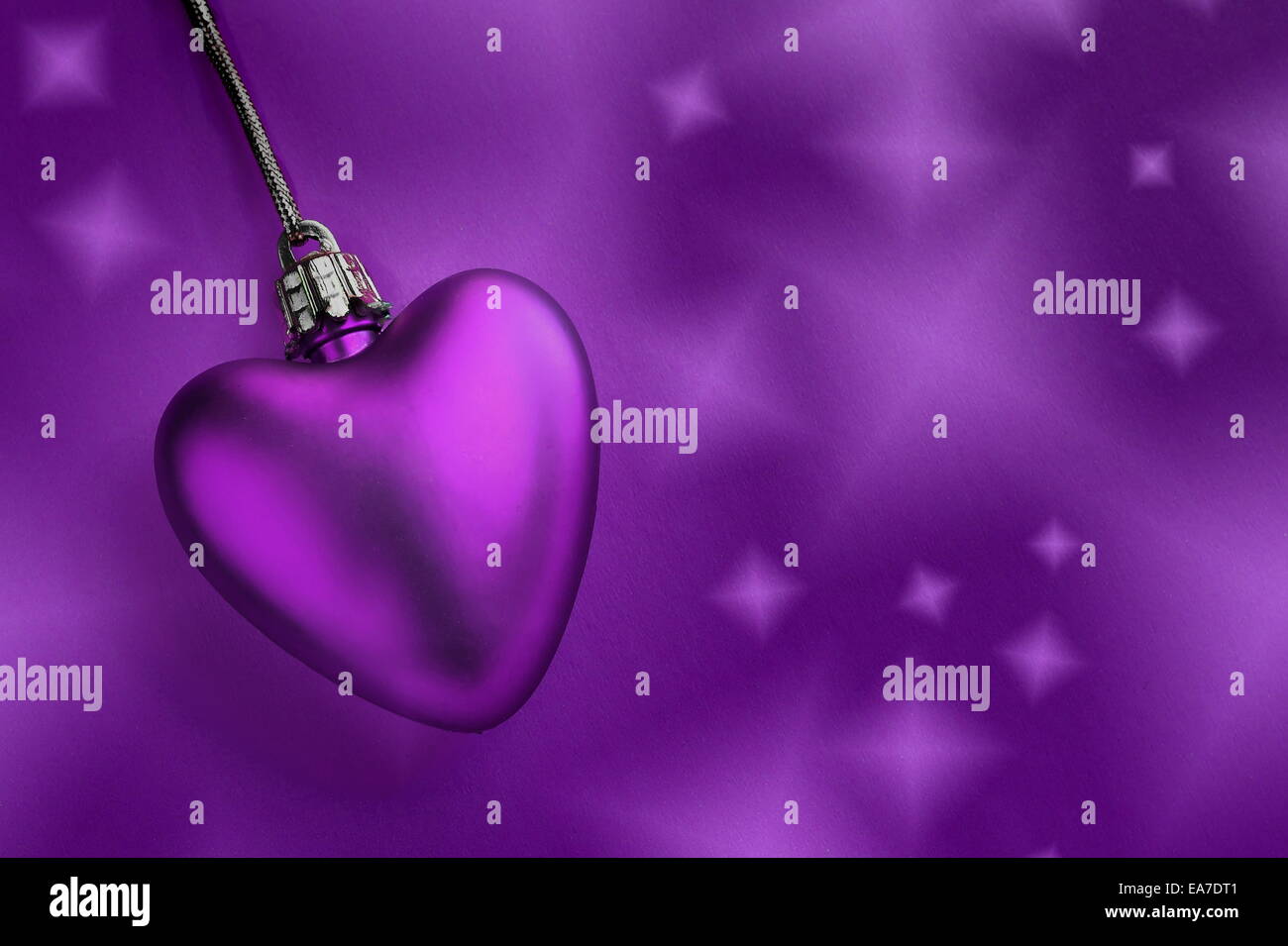 Lavender heart and purple background Stock Photo - Alamy