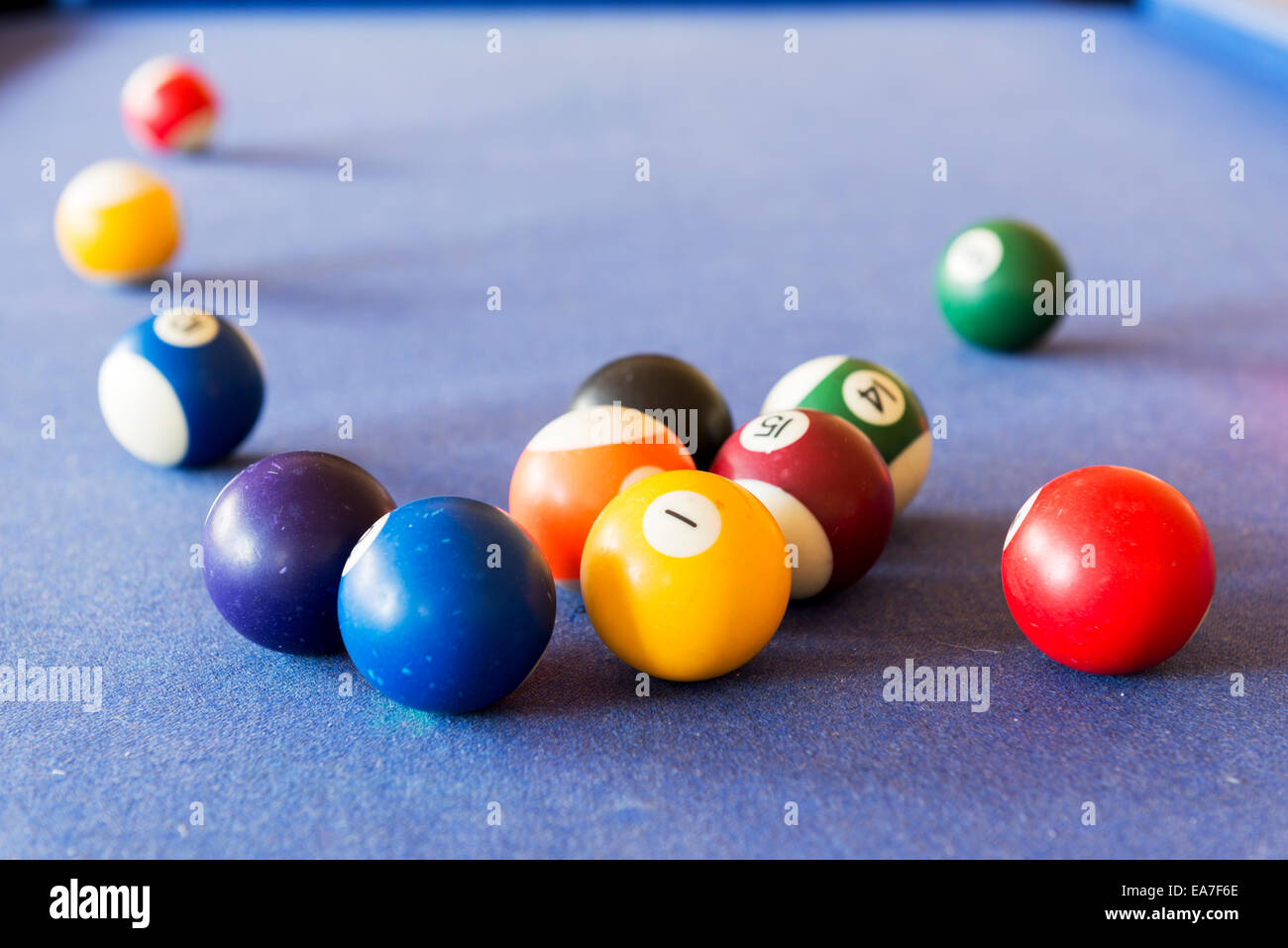 Playing pool on a pool table with billiard balls Stock Photo Alamy