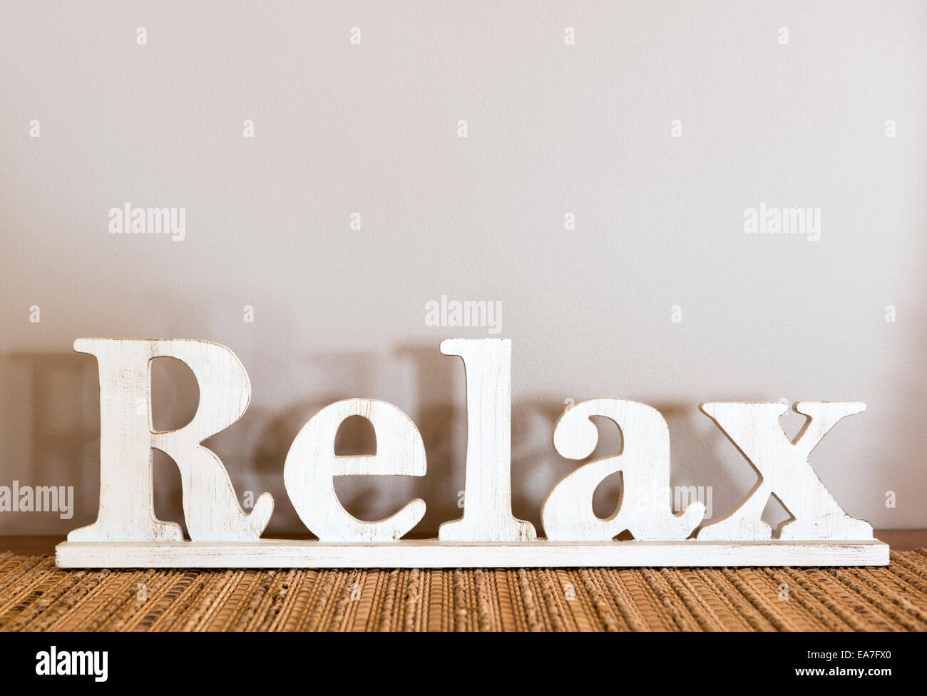 Relax written in large wooden letters with copy space Stock Photo
