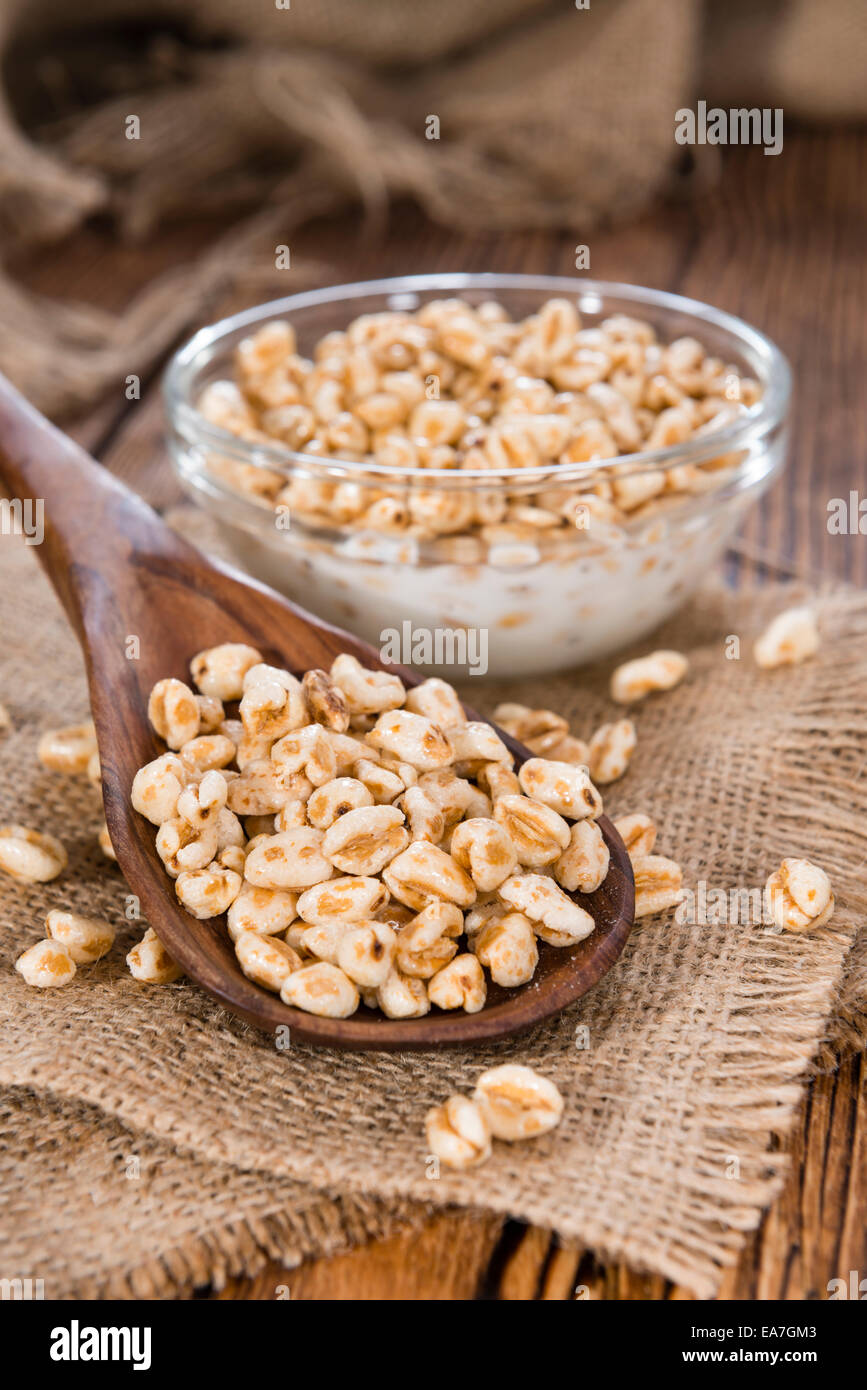 Portion of puffed wheat with milk and honey Stock Photo